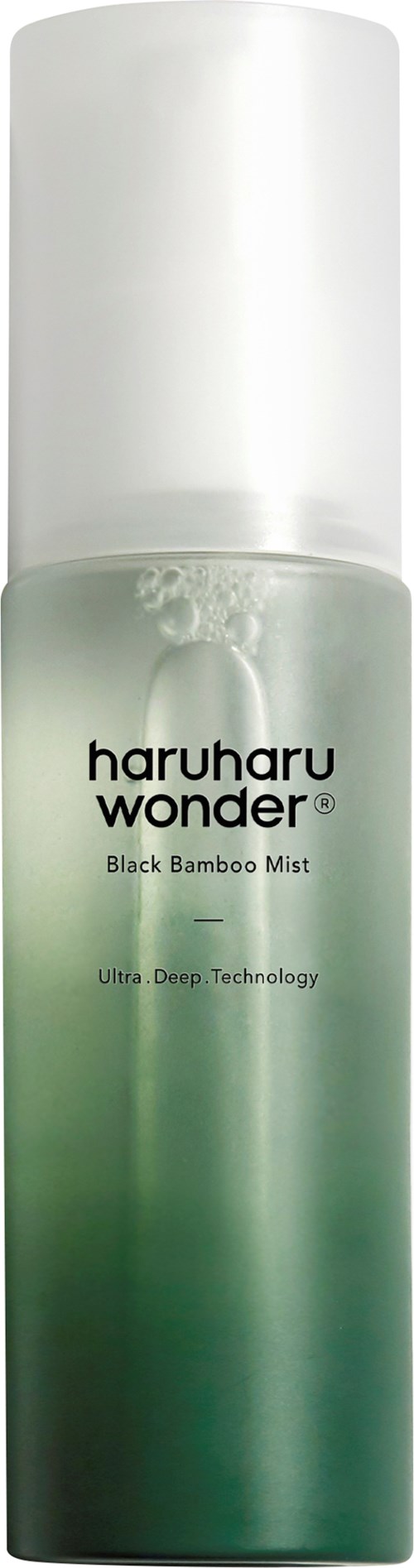 Een lange, witte sprayfles met label "haruharu wonder" en groene vloeistof erin, met tekst "Black Bamboo Mist".