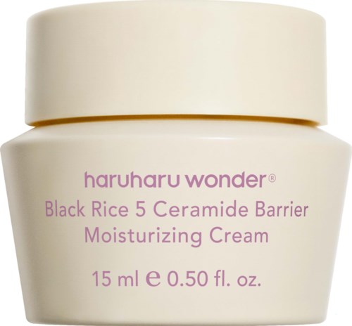 En liten vit burk med lila text. Det är Haruharu Wonder Black Rice 5 Ceramide Barrier Moisturizing Cream.