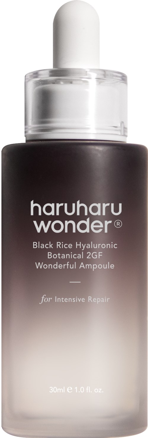 A black and white gradient bottle with a dropper, labeled 'haruharu wonder' for skincare.