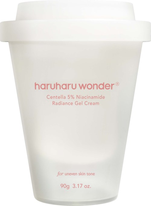 A white jar of skincare cream labeled 'haruharu wonder' with pink text, meant for uneven skin tone, 90g.