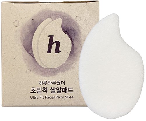 A box with facial pads and one pad outside, labeled in Korean and English, for skincare.