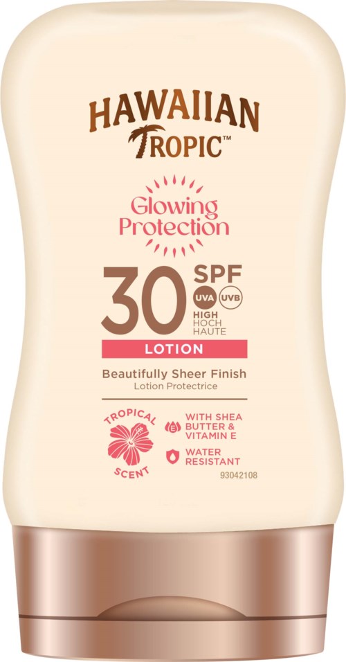 Butelka balsamu z SPF 30, masłem shea, witaminą E i tropicznym zapachem, zapewnia ochronę i promienny wygląd.