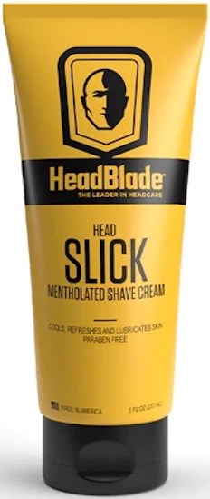 Keltainen putki HeadBlade Head Slick mentholöityyn partavaahdon, musta korkki ja lihavoitu musta teksti.