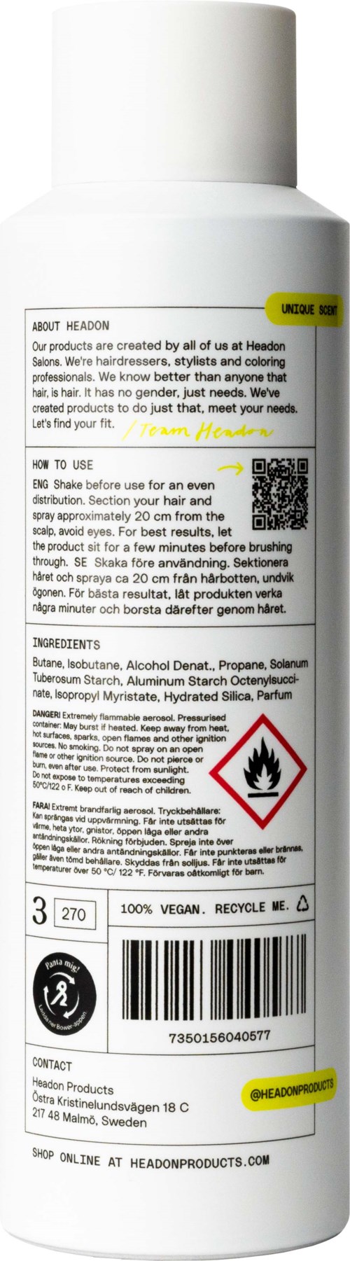 Een lange witte fles met label met tekst, een vlam waarschuwing symbool en verschillende productgegevens.