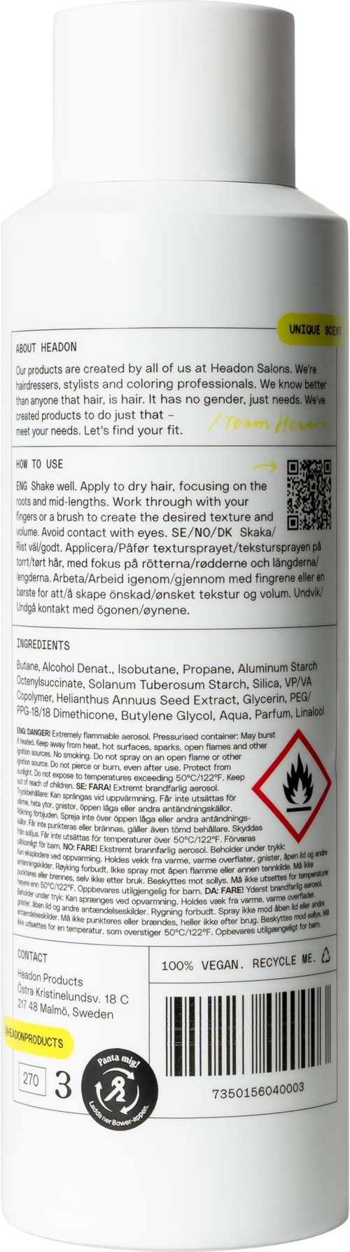 Een witte fles met veel tekst, waarschuwingssymbool voor brandgevaar en enkele gele labels.