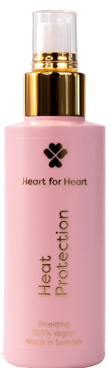 Roze fles met gouden dop, Heart for Heart merk, gelabeld voor hittebescherming, huidverzorgingsproduct.
