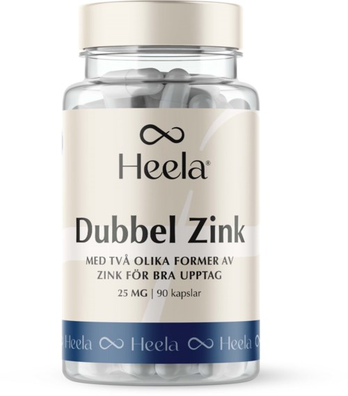 A clear bottle with white and blue label holds 90 zinc capsules, labeled as Heela Dubbel Zink, 25mg each.