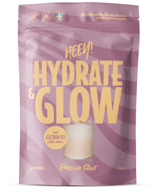 Pink packaging with yellow text and a glass of pink drink, highlighting hydration and glow benefits with electrolytes, passion fruit flavor.
