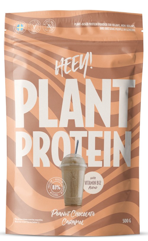 A brown resealable bag labeled 'Plant Protein' with a peanut chocolate caramel flavor, featuring a smoothie glass and health icons.