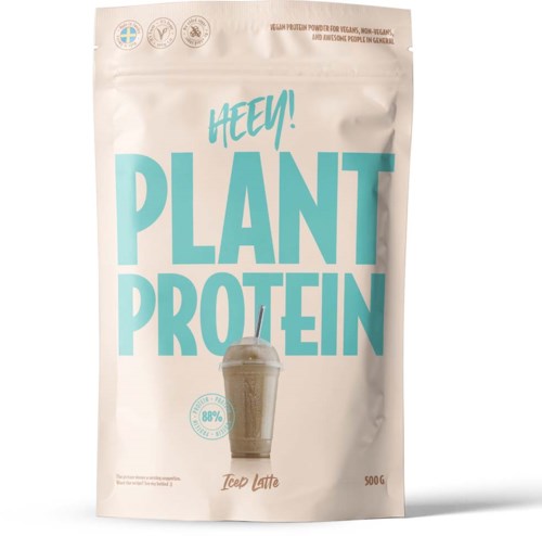 A white package of plant protein with teal text, showing a picture of a coffee latte and some certification symbols.