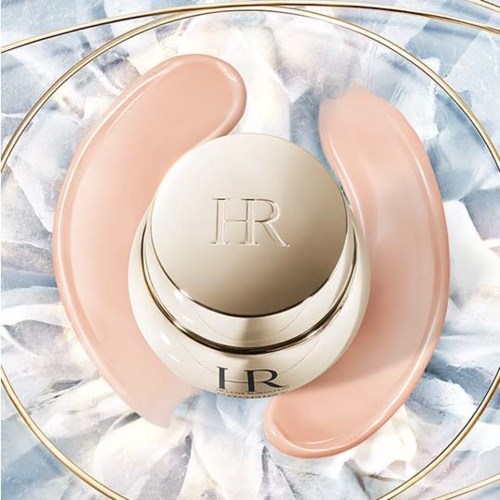 Luxueuze huidverzorgingspot met initialen 'LR' omgeven door roze en roomkleurige spa-elementen.