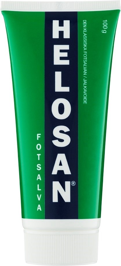 En grön tub med HELLOSAN salva, text, vit lock, och produktdetaljer på förpackningen.