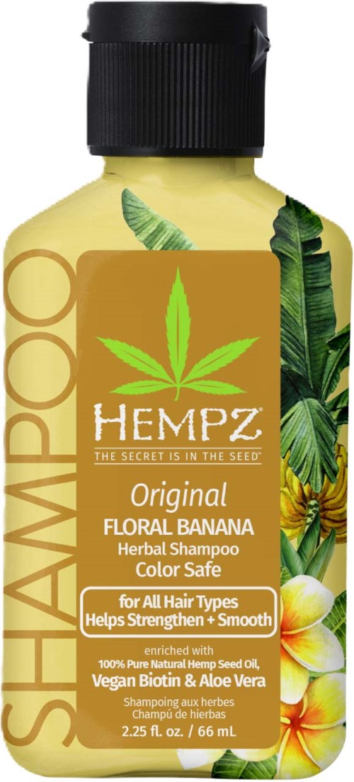 Hempz herbal shampoo bottle with banana and aloe vera images, green and yellow colors, and text about hair care benefits.
