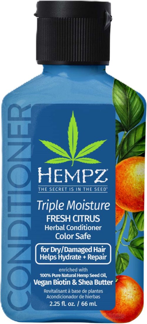 Blue bottle of hemp conditioner with orange and green citrus fruit illustrations, labeled for dry and damaged hair, with natural ingredients.