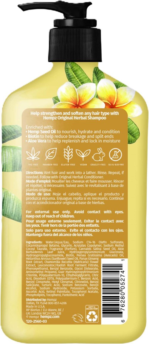 A shampoo bottle with a pump, yellow color, and floral design. Contains instructions and ingredients in small print.