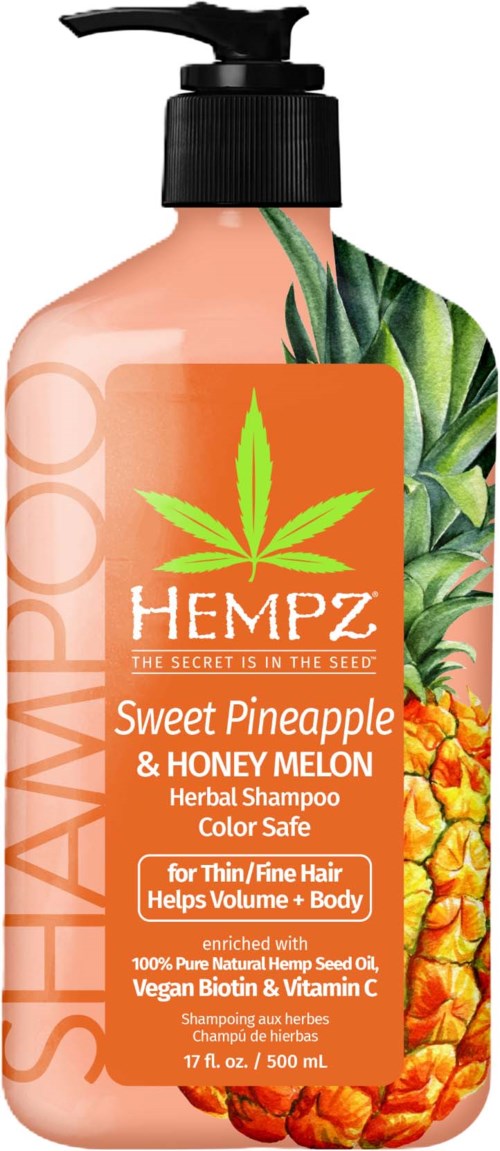 Herbal shampoo bottle with pineapple and honey melon illustrations, labeled for hair volume, safe for color-treated hair.