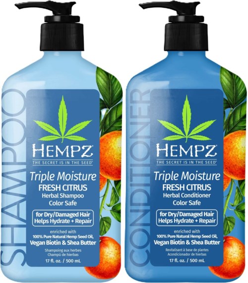 Two bottles of hemp shampoo and conditioner with citrus and leaf illustrations, for dry, damaged hair, moisturizing and repairing.