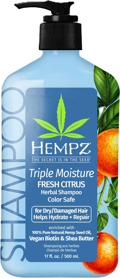 Blue shampoo bottle with green hemp leaf, orange, and citrus images, labeled 'Hempz' for dry, damaged hair, 17 fl oz.