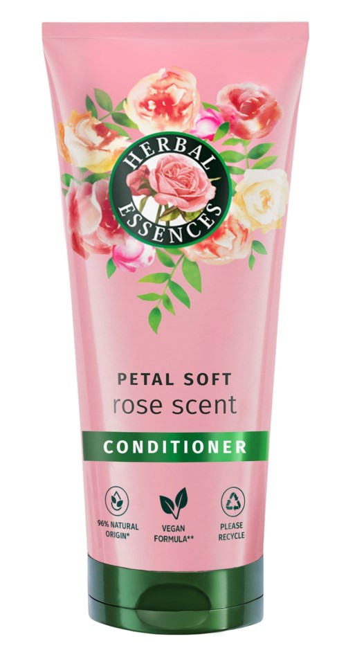 Pink bottle with roses, label shows herbal essence conditioner, petal soft, rose scent, vegan, natural ingredients, recyclable.