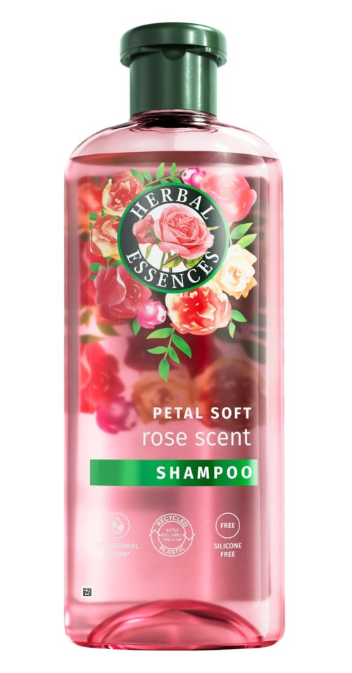 Herbal Essence shampoo bottle with pink color, flower images, green cap, and labels for rose scent and petal soft.