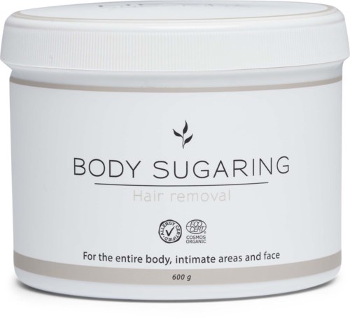 Ein weißer Behälter mit der Aufschrift 'Body Sugaring' für Haarentfernung, geeignet für den ganzen Körper, inklusive Gesicht, 600 g.