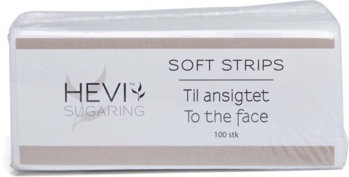 A box of soft strips for face, labeled 'HEVI SUGaring' with instructions 'Til ansigtet to the face, 100 pieces.