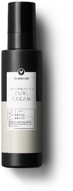Een zwarte fles met pomp, gemerkt als krullencrème voor haarstyling.