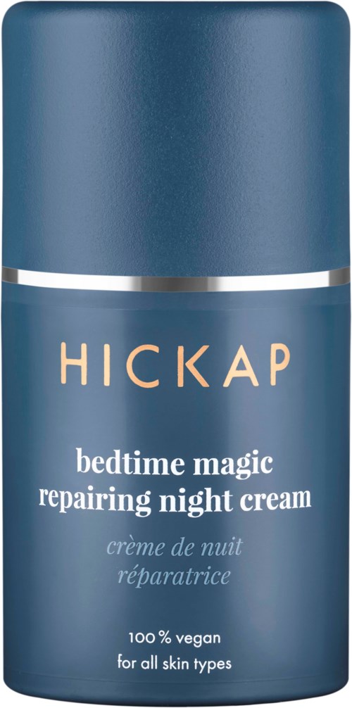 A blue bottle with a silver band, labeled 'Hickap bedtime magic repairing night cream,' suitable for all skin types.