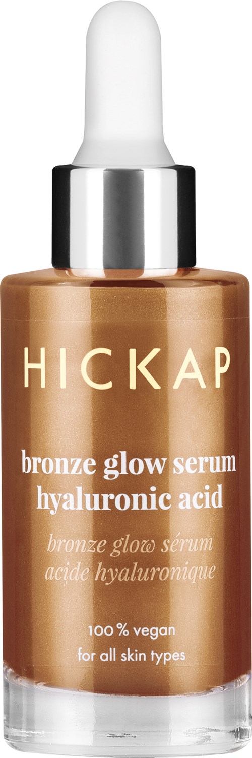 A bottle of bronze glow serum with a dropper, labeled 'HICKAP' and 'hyaluronic acid', for all skin types.