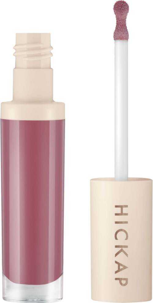 Lip gloss tube with a pinkish gloss and a wand applicator.