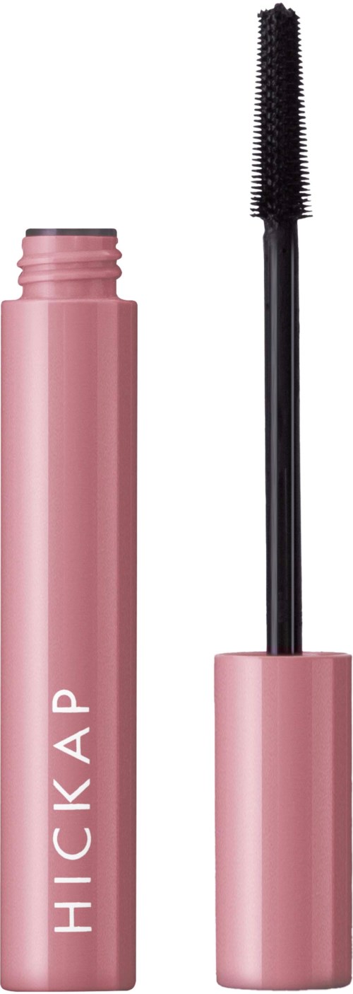 A pink mascara tube with the wand removed, showing the brush and open tube.