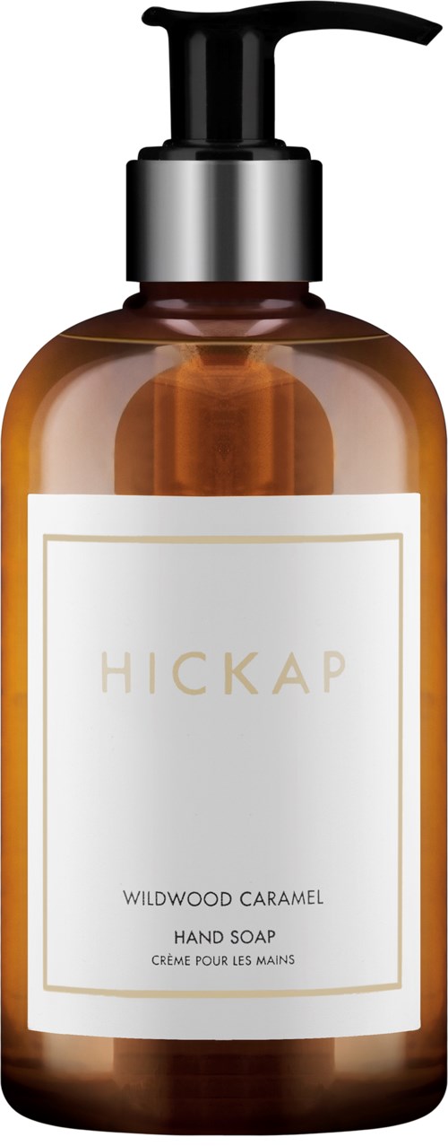 Brown bottle with black pump, white label says Hickap Wildwood Caramel Hand Soap.