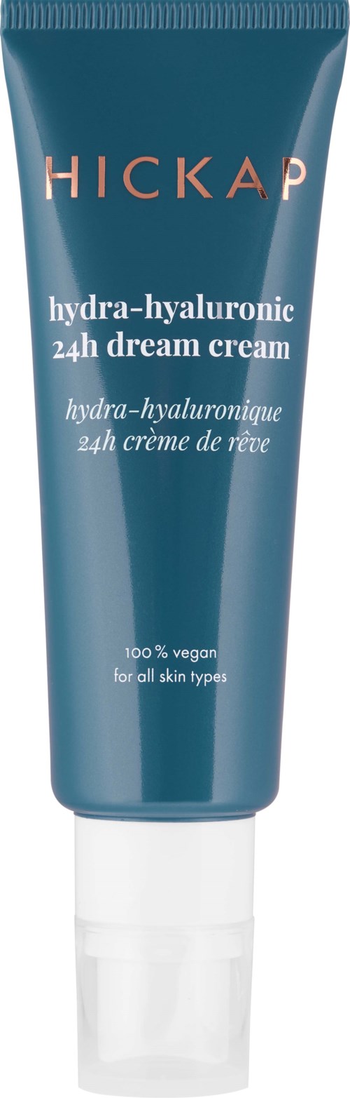 The bottle is blue with white and orange text, labeled as a vegan face cream for hydrating skin day and night.
