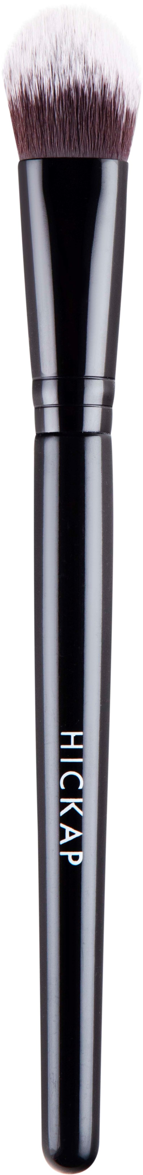 A makeup brush with a dark handle and fluffy white bristles, labeled 'HICGAP' on the handle.