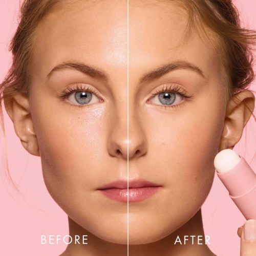 Split face showing skin before and after applying skincare product on a pink background.
