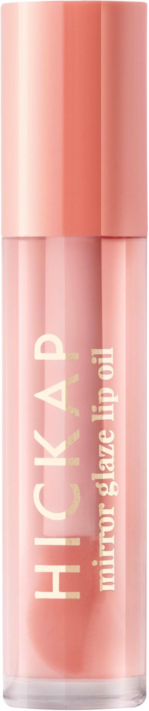 A pink lip gloss tube with a shiny cap, labeled 'HICKHACK mirror glaze lip oil.'