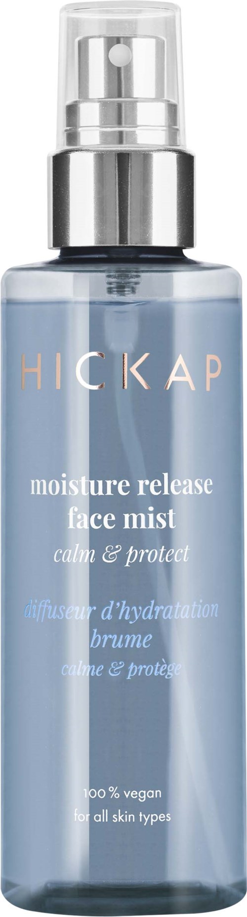 Blue facial mist bottle with spray top, labeled 'HICKAP moistures release face mist, calm & protect,' vegan, suitable for all skin types.