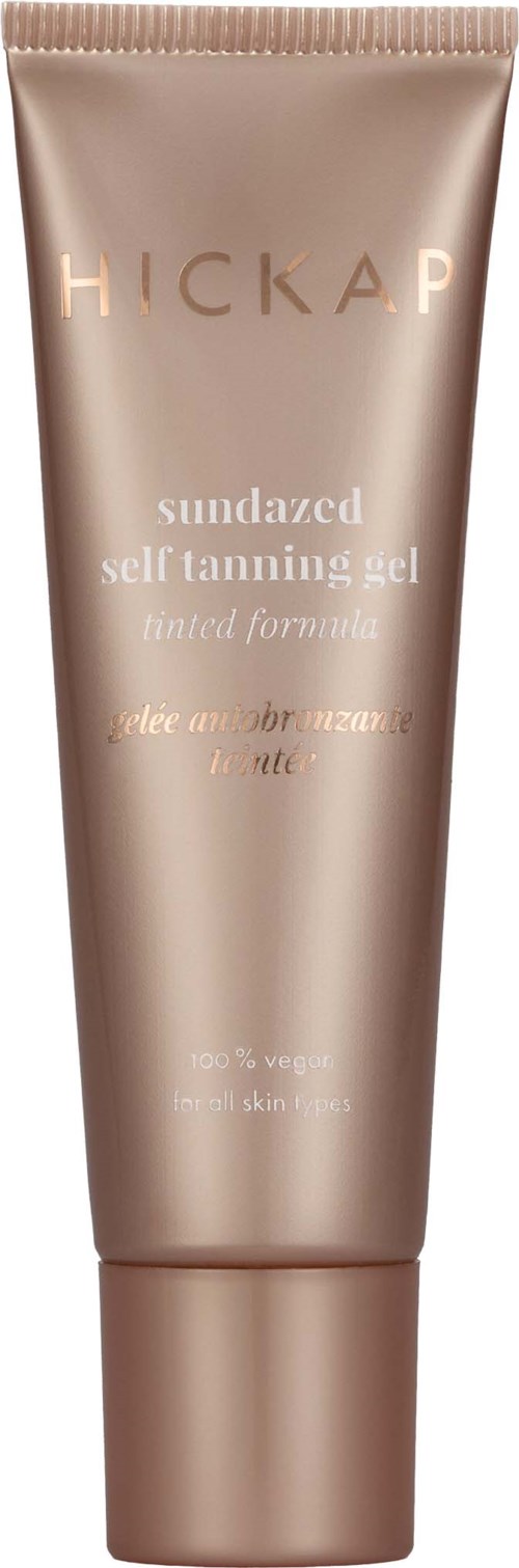 En beige tub med guldtext för självbruningsgel som heter Hickap, utformad för att få en solkysst glöd.