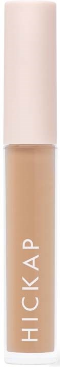 A concealer with a clear tube, light beige makeup, and a pink cap. The brand name is HICKA P.