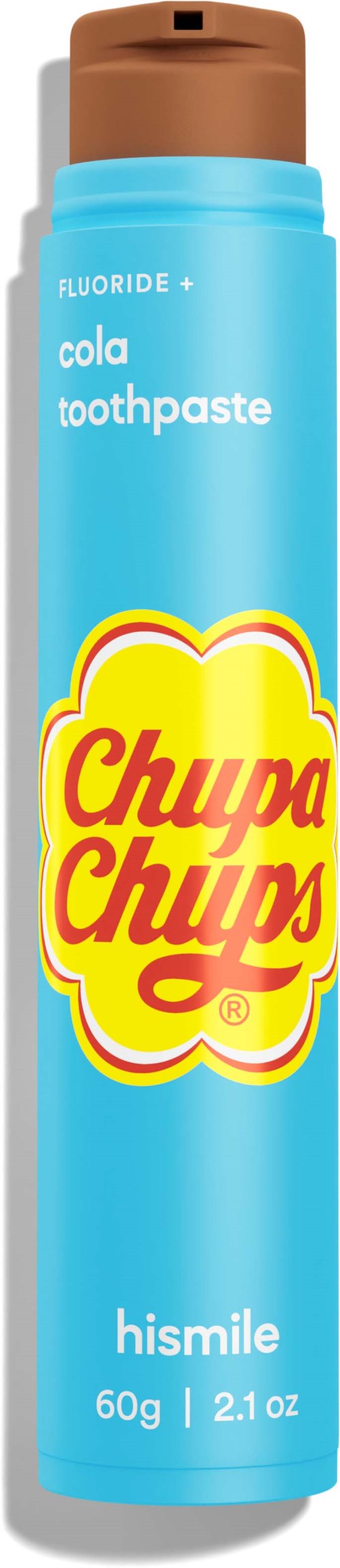 A blue tube of Chupa Chups toothpaste with a brown cap, labeled "cola" flavor, contains 60g.