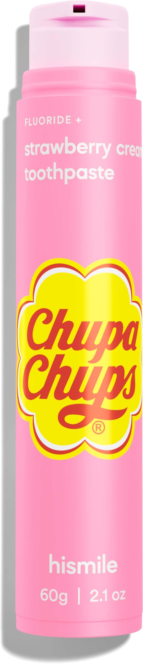 Pink tube of Chupa Chups strawberry-flavored toothpaste with yellow logo and white text.