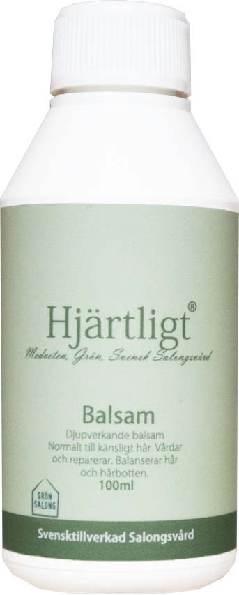 A white bottle with a green label and white cap, labeled 'Hjärtligt Balsam' for skin and healing. 100ml.