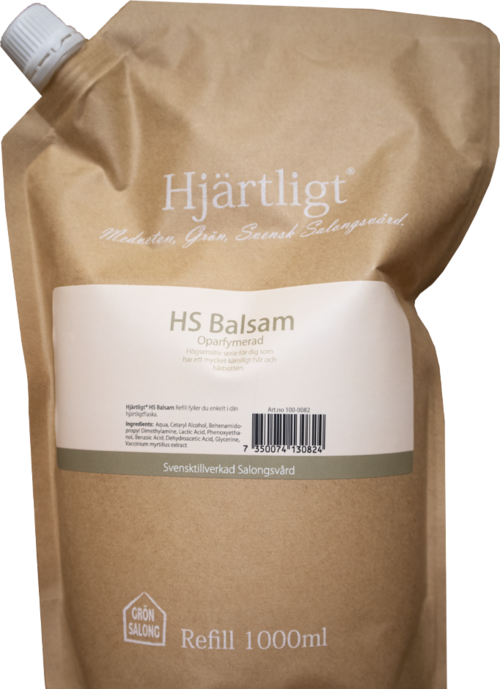 A brown refill pouch with a white label, containing HS Balsam with Swedish text and a barcode.