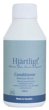 A white bottle with a blue label, showing it is heart-shaped conditioner for moisturizing and strengthening hair.