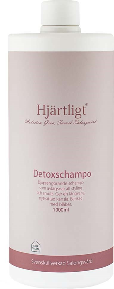 Een detoxshampoofles met label 'Hjärtligt', 1000ml capaciteit, zachtroze en wit design, en Zweedse tekst.