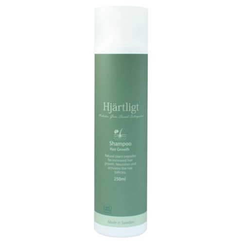 A green and white shampoo bottle labeled 'Hjärtligt' that promotes hair growth, made in Sweden, containing 250ml.
