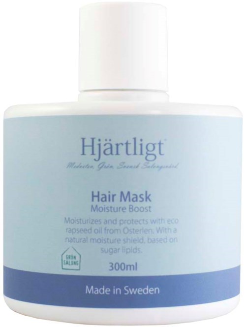Eine hellblaue und wei dfe Dose mit der Beschriftung H e4rtligt Hair Mask, 300ml, in Schweden hergestellt, f fcr Feuchtigkeit und Schutz.