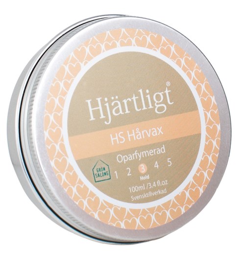 Round container with beige and peach label, containing wax for hair removal, named Hjärtligt, 100ml.