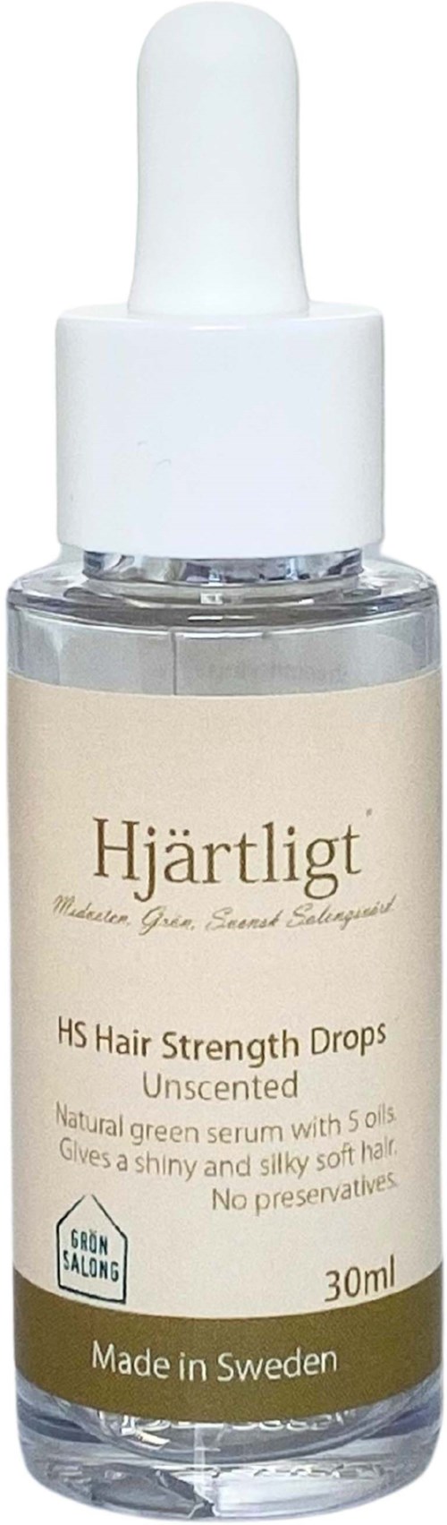 A small transparent bottle with a white dropper cap, contains hair strength drops labeled 'Hjärtligt,' made in Sweden.