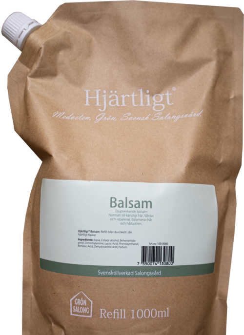 A brown refill pouch with white and green label for balsam, 1000ml, from a Swedish salon. The package has a white cap.